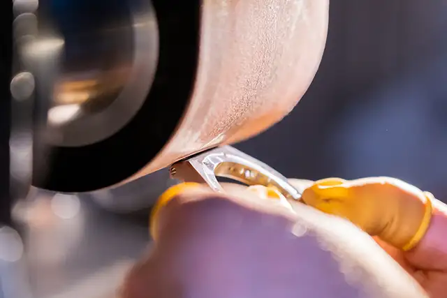 Professional polishing of a Hamilton watch for a flawless finish